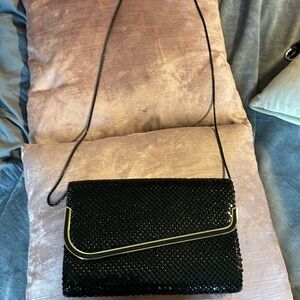 Black shiny clutch purse